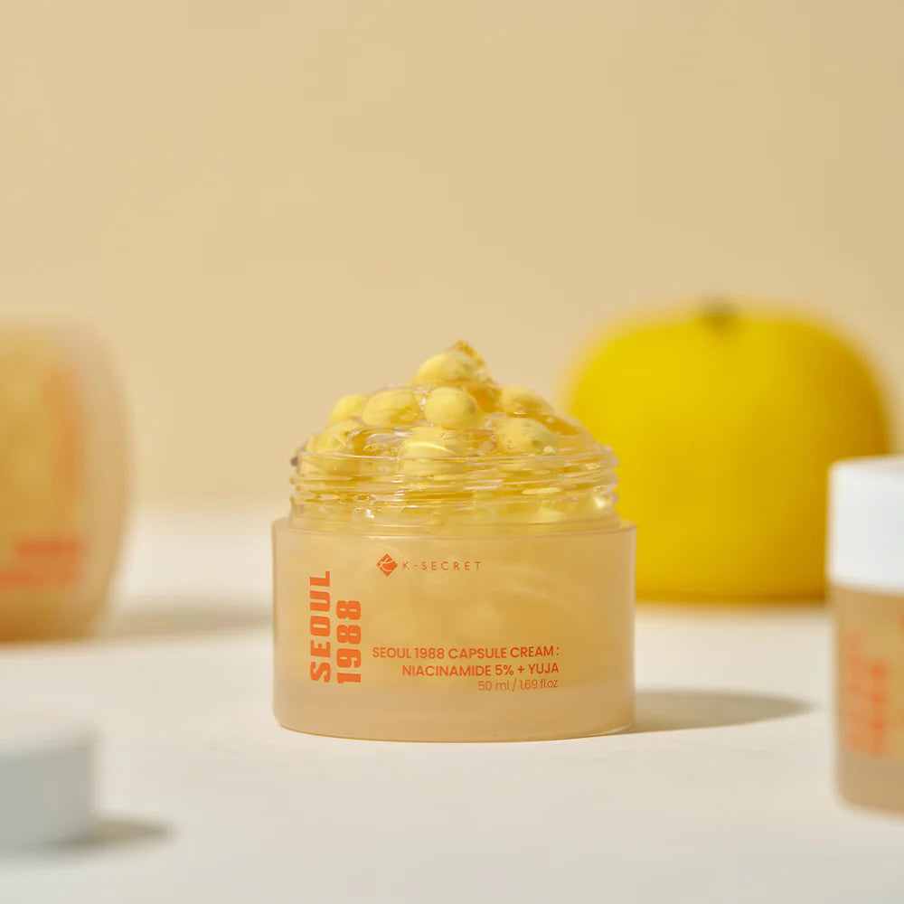 Skincare product jar with visible brand name on a neutral background