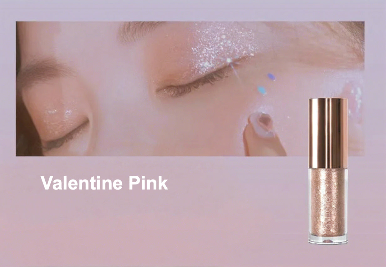 Glittery makeup product with 'Valentine Pink' label on a blurred background