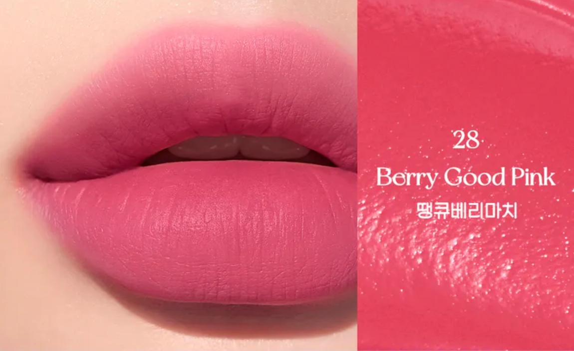 Close-up of pink lipstick on lips with color swatch labeled '28 Berry Good Pink'.