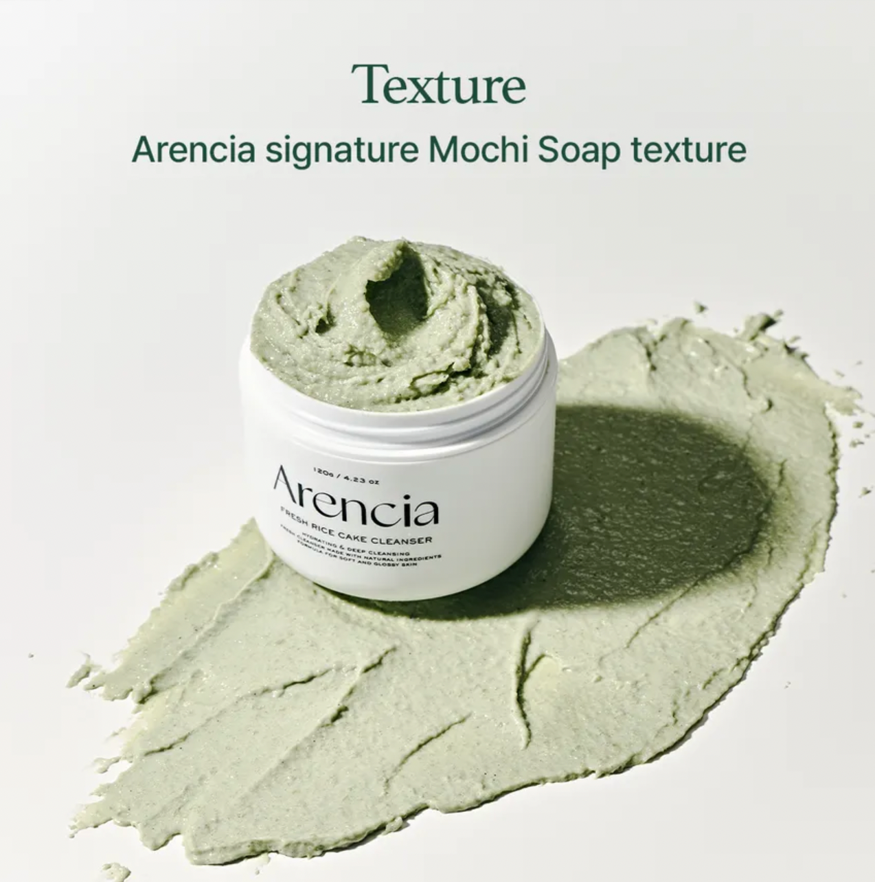 Arencia signature Mochi Soap with a scoop of soap texture on a light gray background