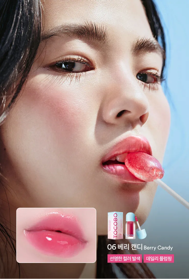 Close-up of a person wearing berry candy lip gloss with Tocoto branding.