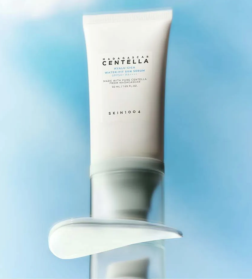 Skincare serum tube with brand name on a light blue background