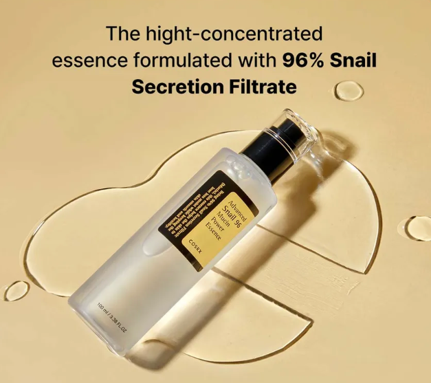 Skincare bottle with snail secretion filtrate on a beige background