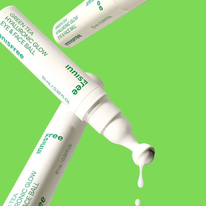 Three 'innisfree' eye and face balls on a green background