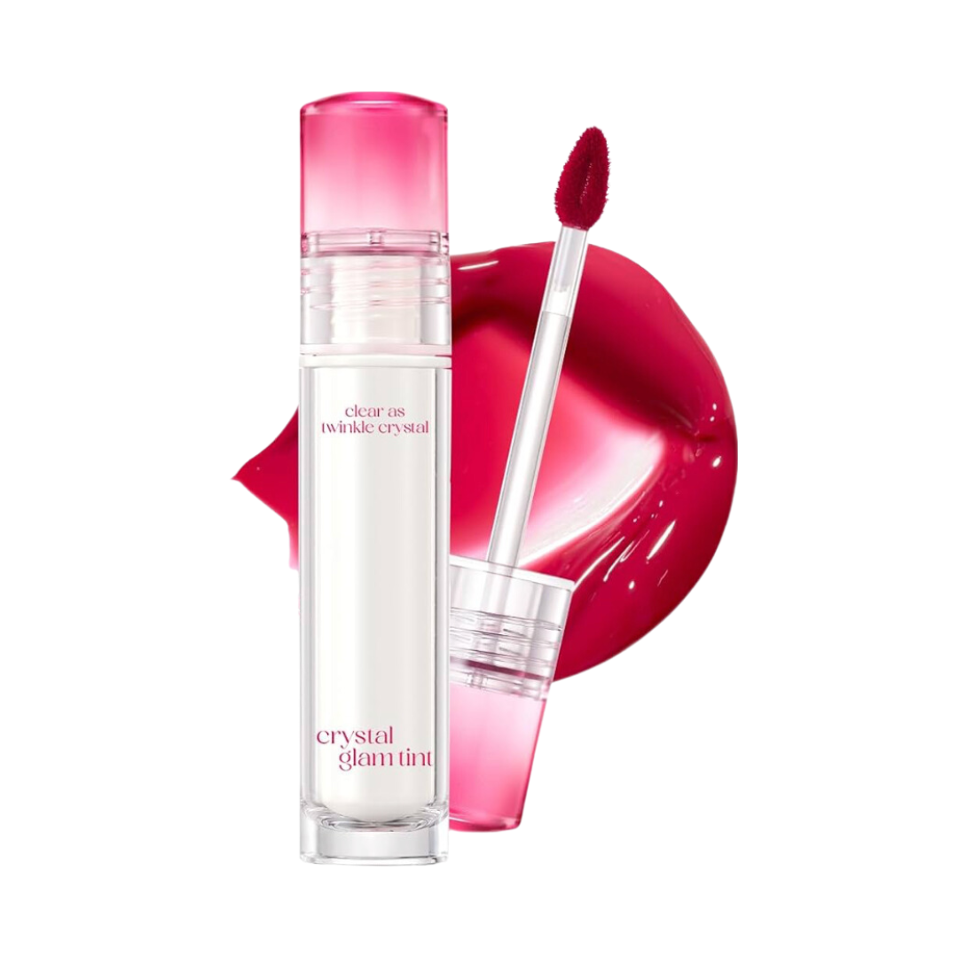 Cosmetic bottle with pink cap and applicator on a white background