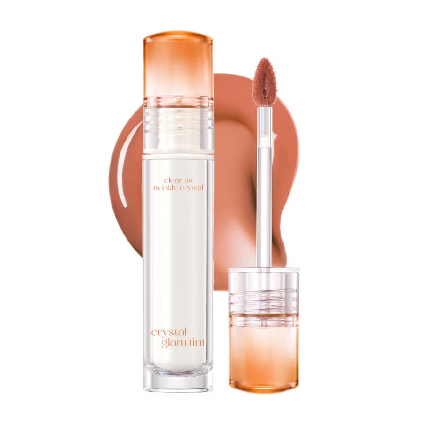 Cosmetic product with applicator and visible brand name on a white background