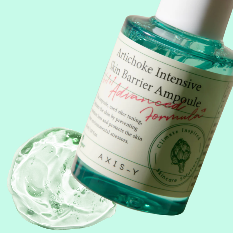 Axis-Y Atticchoke Intensive Skin Barrier Ampoule with green liquid on a light green background