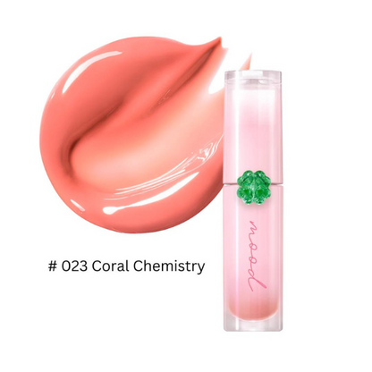 Lipstick with coral color swatch and brand name on a white background