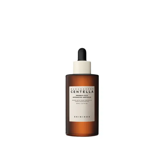 Skincare dropper bottle with a white label on a white background