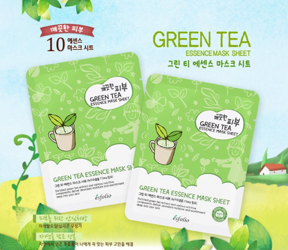 Green tea essence mask sheet packaging with brand name on a light blue background