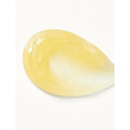 Yellow teardrop-shaped object on a white background