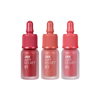 Three bottles of Ink Airy Velvet lip products on a white background
