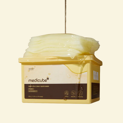 Jar of Medicube Deep Vita C Daily Quick Mask on a beige background