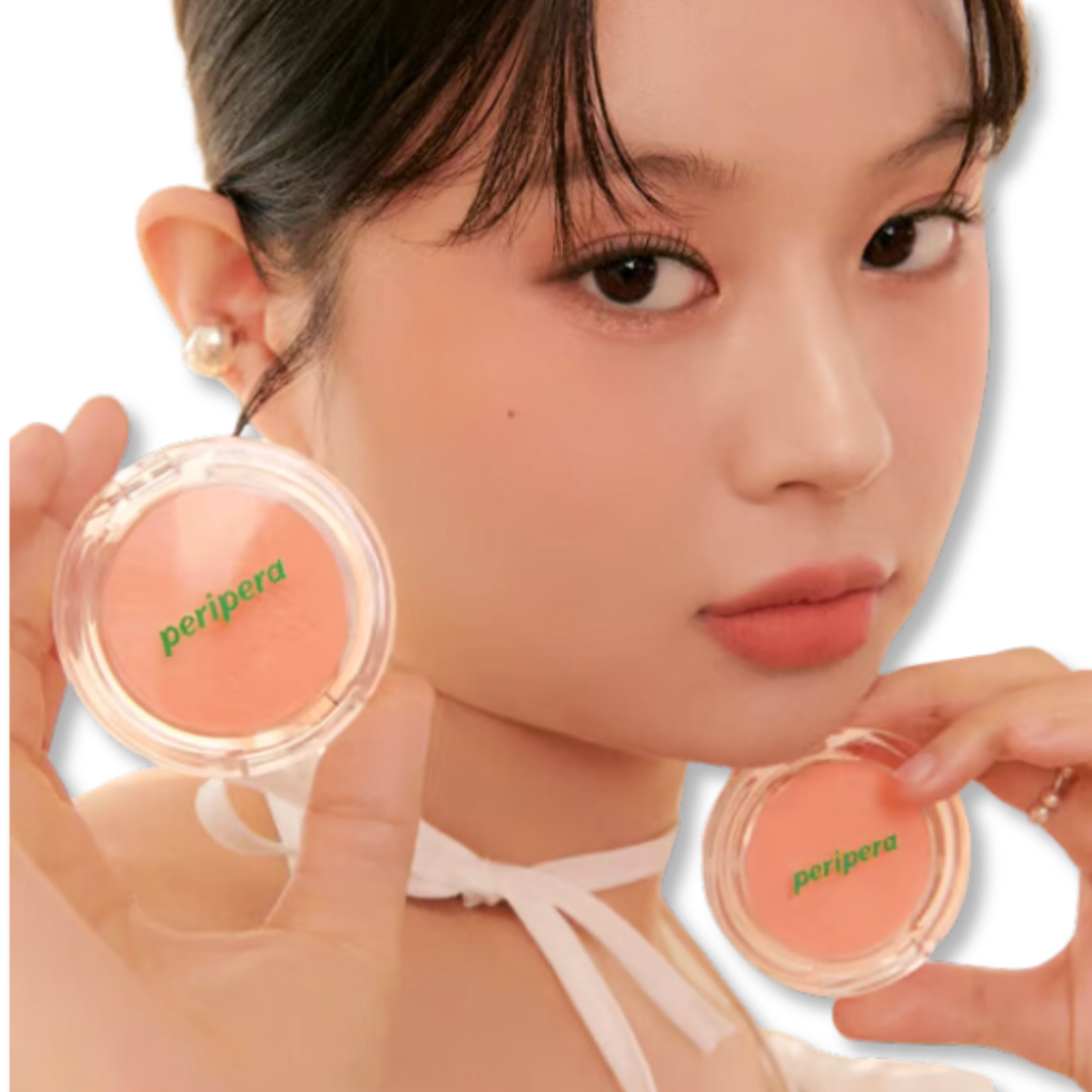 Woman holding two Peripera makeup products against a white background